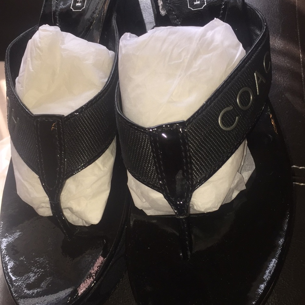 Coach wedges. Size 8.5, never been worn.